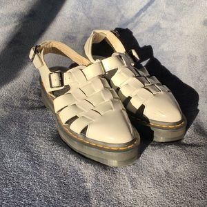 White patent leather Dr. Martens sandals